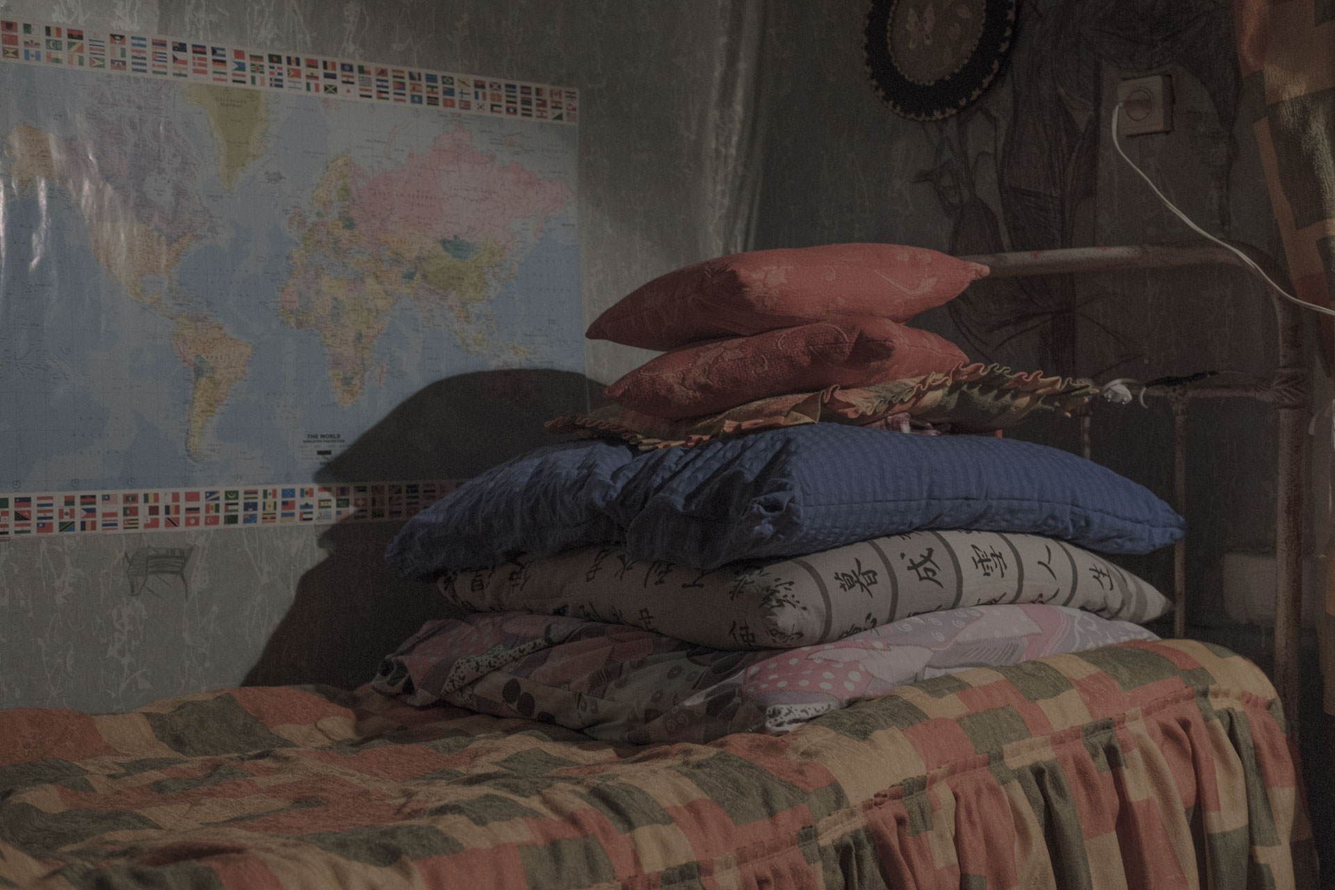 This is the room I sleep in when I come to visit my mother. My mother folds the pillows as my grandmother and my great-grandmother used to do. It’s a traditional way of laying pillows in a village. Krasnopolye, Mogilev regi-on, Belarus, 2020.