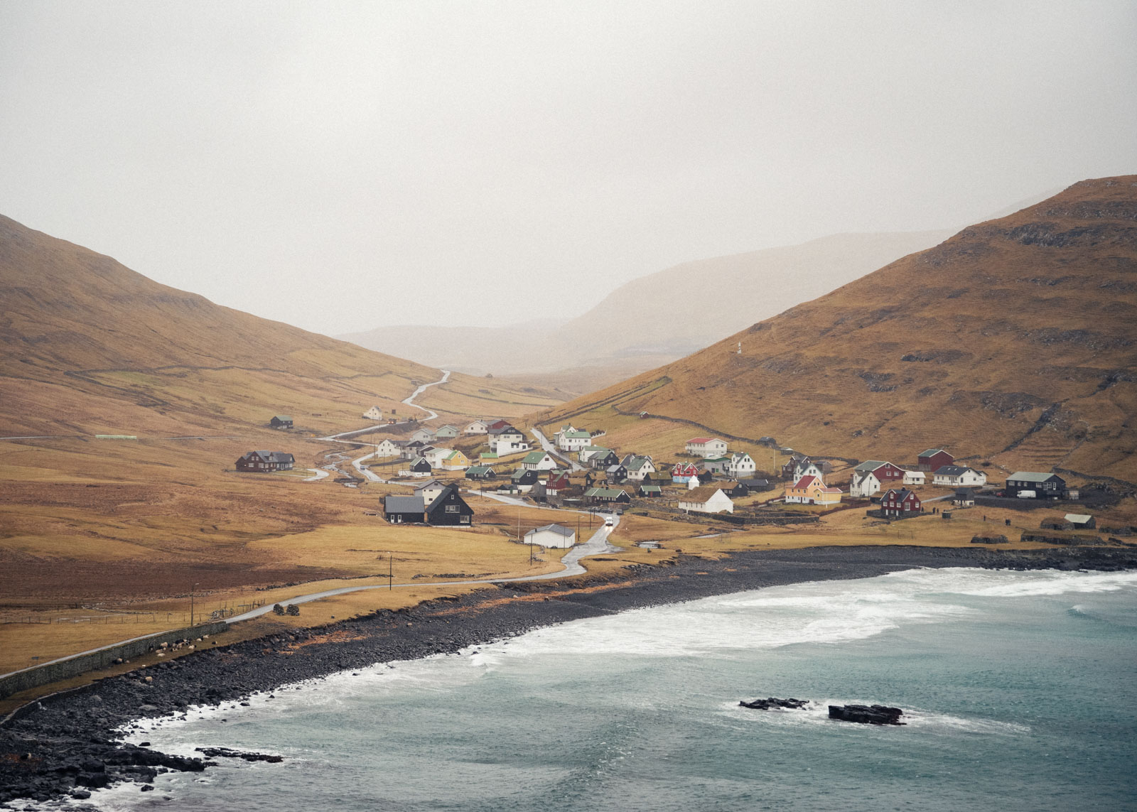 Húsavík, an island town of around 130 people located on the southern island of Sandoy, saw over 500 visitors during the opening of the subsea tunnel from the mainland in late December and continues to experience a steady flow of tourists even now.. 30.01.2024, Husawik, Faroe Island, ©2024 Niclas Tiedemann